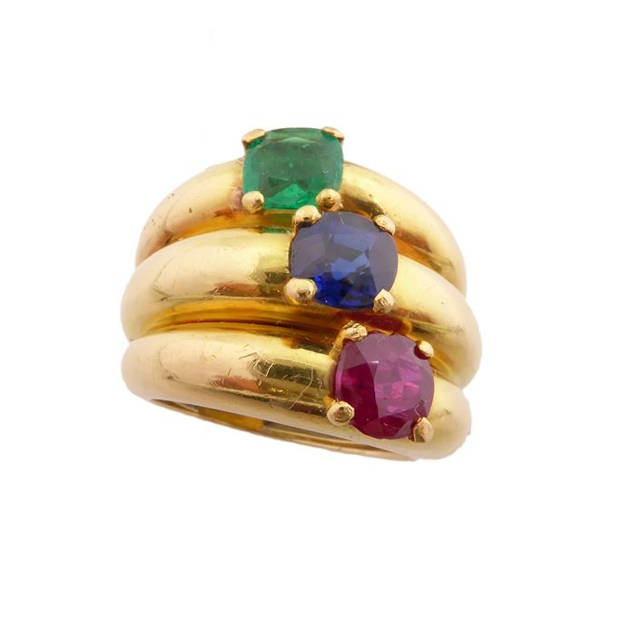   Cartier - Gold, ruby, emerald and sapphire triple band ring | MasterArt